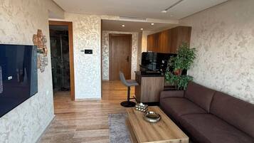 Luxury Studio, Balcony, City View | Living area