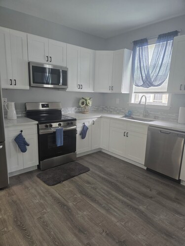 Lovely Brand New  3-bedroom apartment with AC all the comfy amenities.