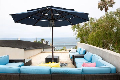 The Bluffside Torrey Pines Beach House, a stunning white water view home.