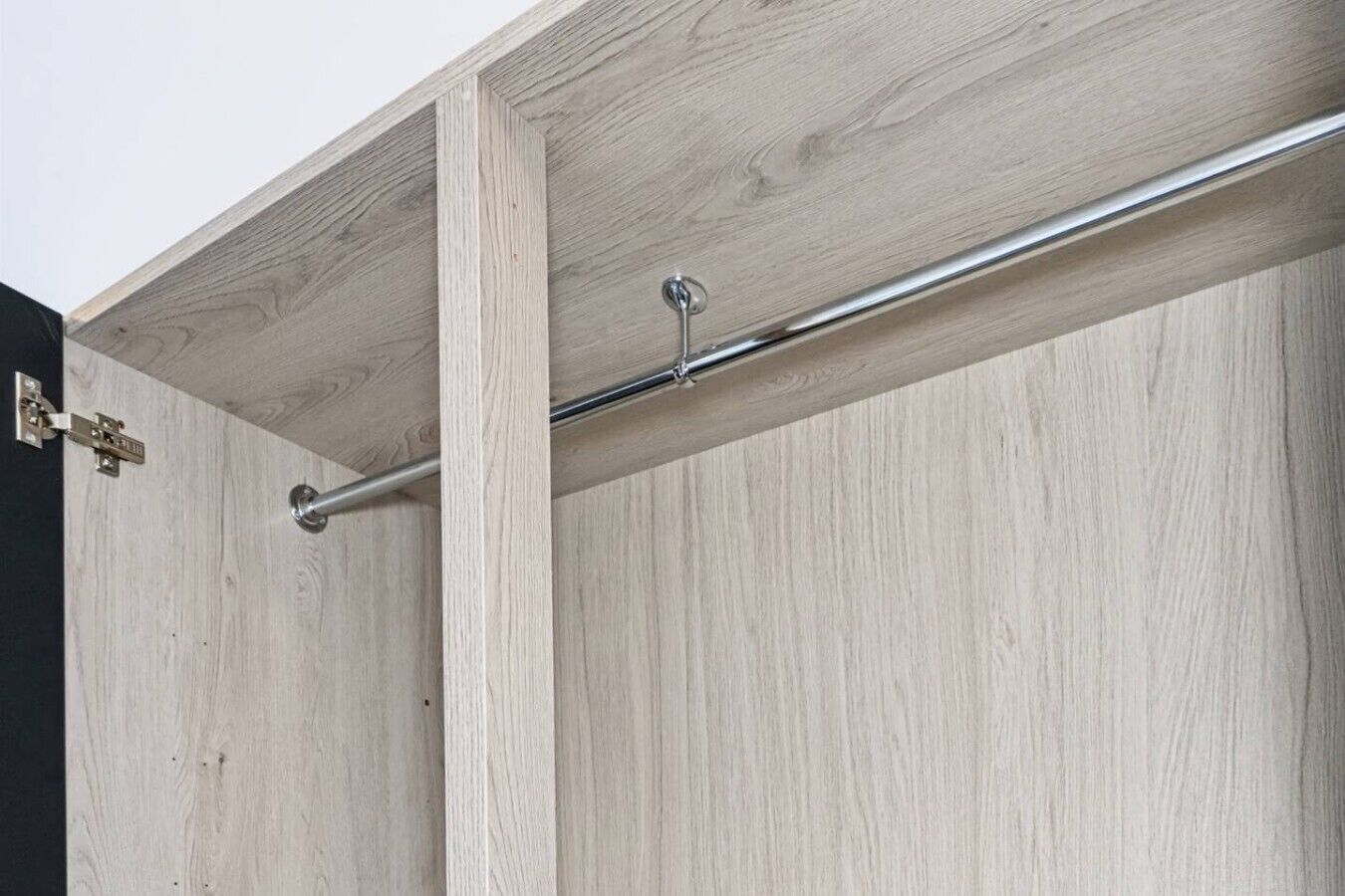 A wooden structure with a metal rod and a latch mechanism.