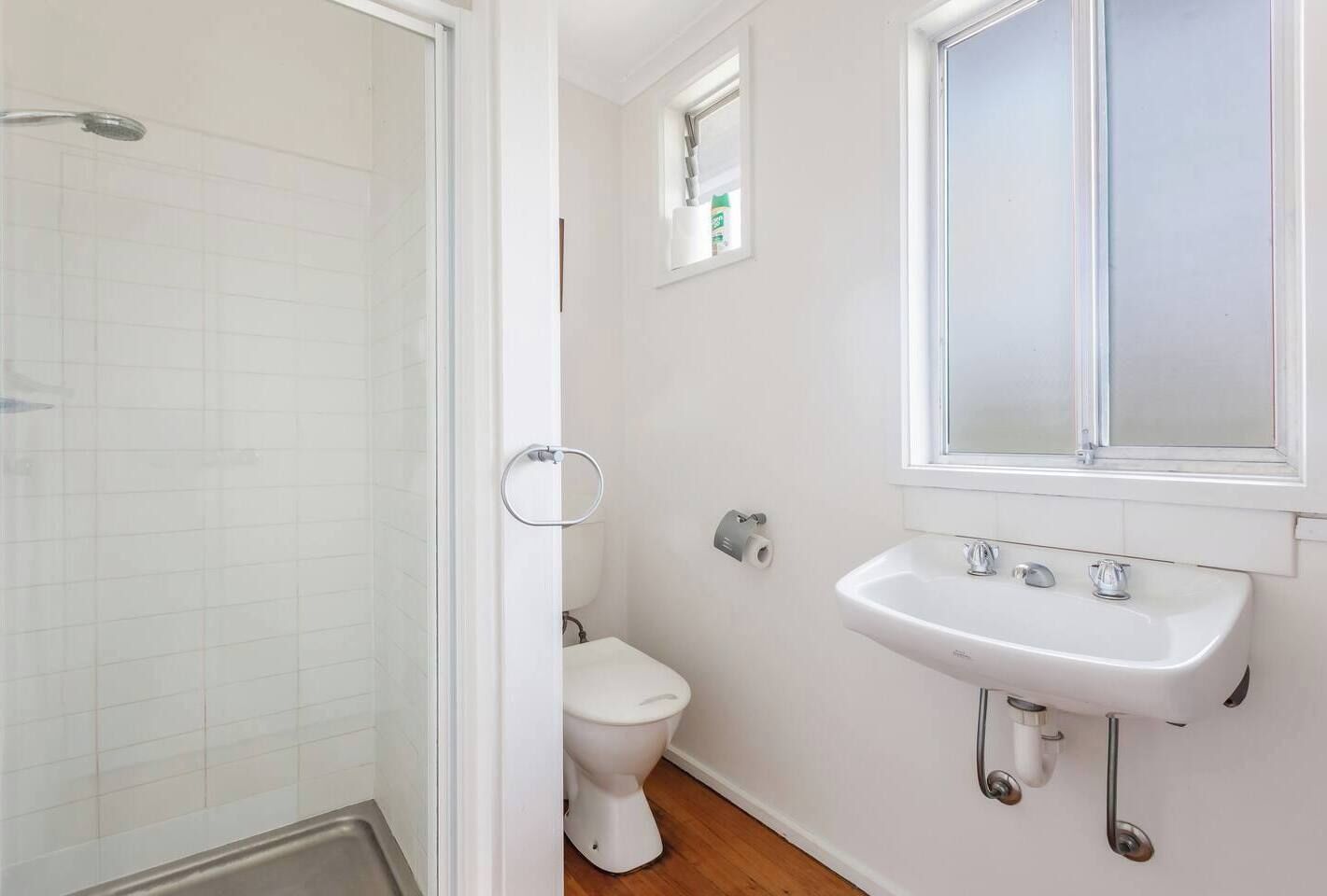 The family bathroom offers a walk-in shower, complimentary toiletries and bright daylight to start mornings feeling refreshed.