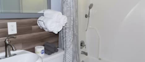 Shower, hair dryer, shampoo