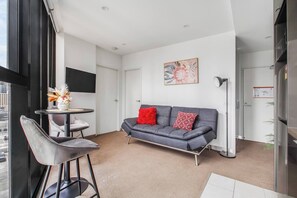 Living area - Protea Corner Laid back CBD Stay by Yarra and Dining (Southbank)