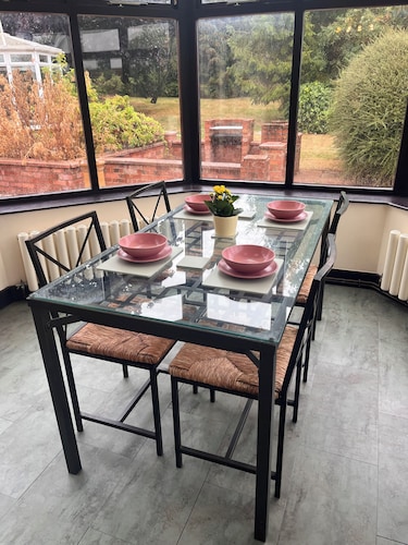 The Old Farmhouse - six-bedroom house in rural village for up to twelve guests.