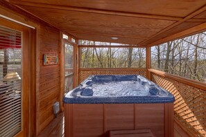 Indoor spa tub - A Wolf's Den Cabin Rental (Sevierville)
