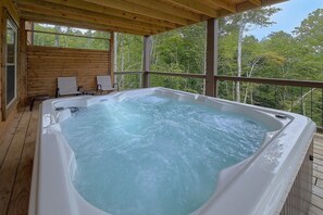 Outdoor spa tub - A Peaceful Haven Cabin Rental (Wears Valley)