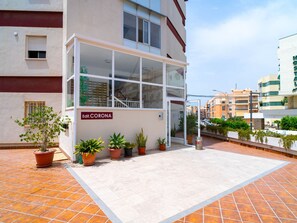 A building with a sign reading 'Edif. CORONA' and a glass door entrance. - Corona 204 Apartment by Casasol by Interhome (Nerja)