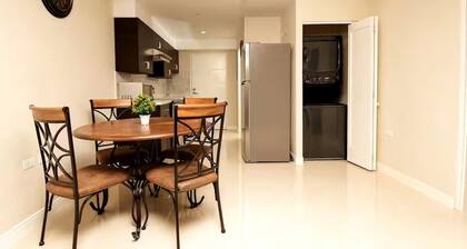 Modern 2BR 2BA Oasis in Portmore • Smart TV • AC • Free Parking