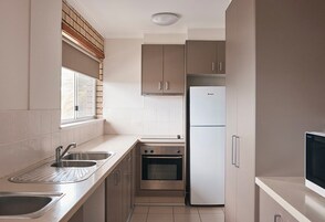 Family Apartment, Non Smoking, Balcony | Private kitchen