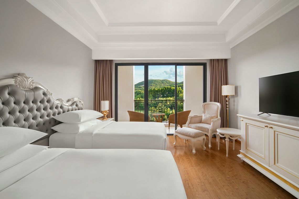 Chambre Deluxe Double ou avec lits jumeaux, balcon, vue jardin | Coffres-forts dans les chambres, chambres insonorisées