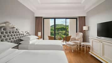 Chambre Deluxe Double ou avec lits jumeaux, balcon, vue jardin | Coffres-forts dans les chambres, chambres insonorisées