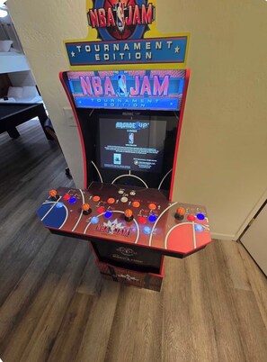 An NBA Jam Tournament Edition arcade machine with a digital display and multiple control buttons. - Near BassLake, sleeps 16, BBQ, Game Room (Bass Lake)
