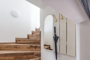 A staircase with wooden steps and a white wall. - Hunters Lodge 1 Lake Balaton, Badacsony Wine Region, Badacsonytomaj, Hungary (Badacsonytomaj)