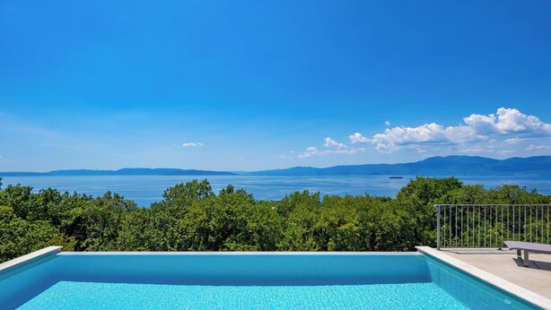 A clear blue sky, a swimming pool, and a view of the sea and mountains. - Holiday Home Elora Seaview Private Pool And Garden, Kostrena, Croatia (Kostrena)