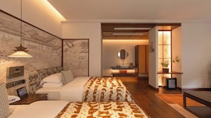 A modern hotel room with a large bed, a bedside table, a wall-mounted TV, and a bathroom visible through an open door. - Yunye Fengwan Song's Aesthetic Hotel (Deqin)