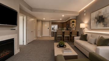 Family Suite, City View | Living area | 43-inch flat-screen TV with cable channels