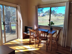 Living area - Bega Cottage, private space overlooking farm land 5 min walk to shops and cafes (Bega)
