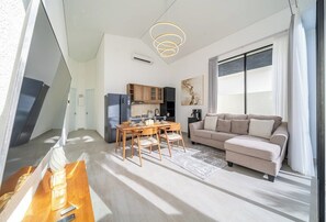 Living area - Amazing 3BR w Beach Access, Pool+Garden & Office (South Kuta)