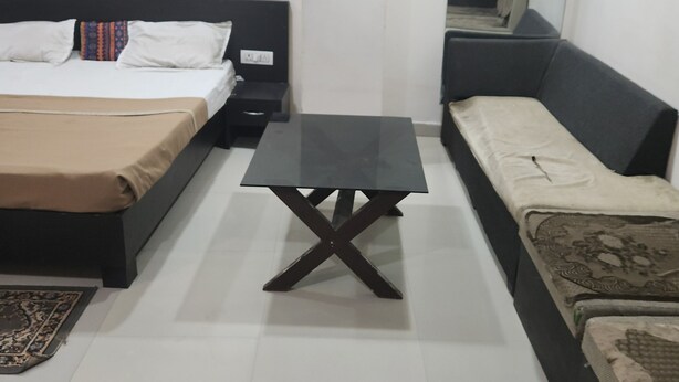 Premium bedding, memory foam beds, desk, laptop workspace
