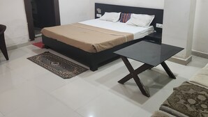 Premium bedding, memory foam beds, desk, laptop workspace
