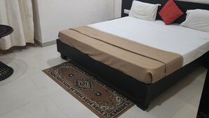 Premium bedding, memory foam beds, desk, laptop workspace