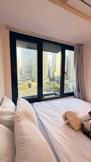 Unclassified image, 3 of 20, button - Central Makati Place with Queen bed and 55 inch SMART TV (Makati)