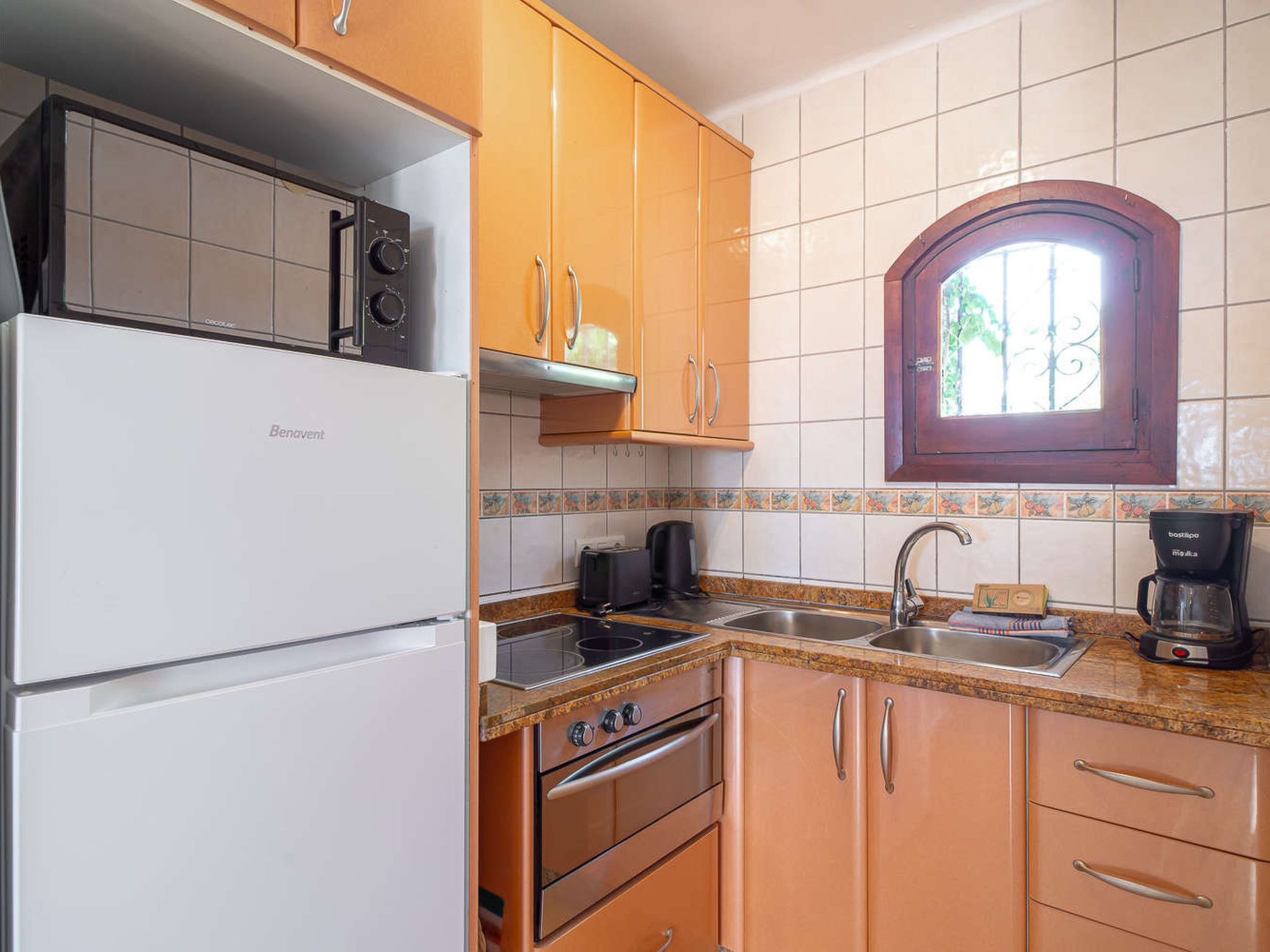 Fridge, microwave, oven, cookware/dishes/utensils