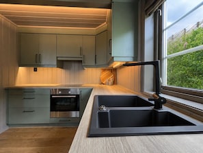 Private kitchen - Modern and Homey Apartment near slopes in Kikut, Geilo (Hol)