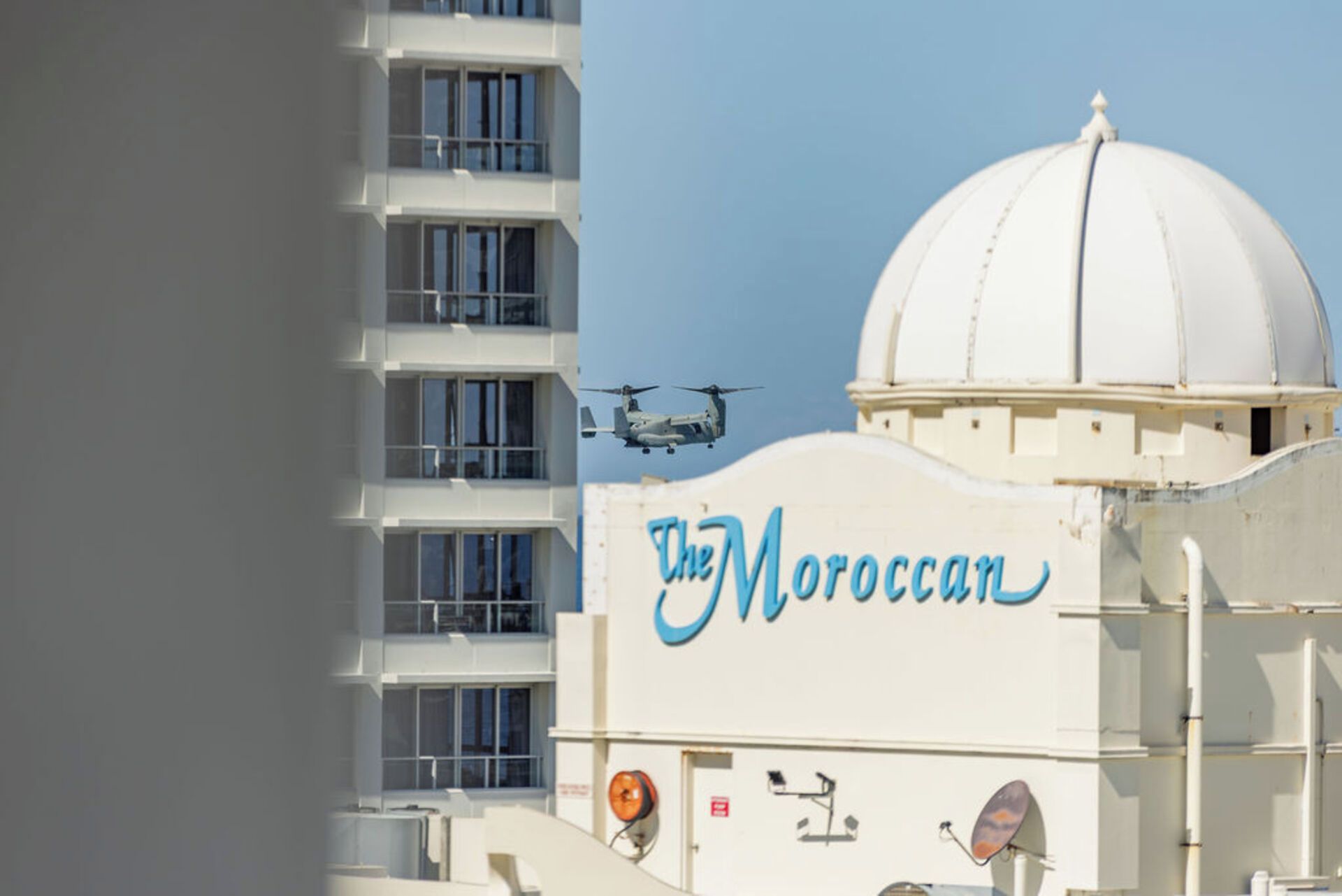 A building with a dome and the text 'The Moroccan' on its side.