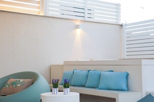 Estudio de lujo, vistas parciales al mar | Jardines del alojamiento