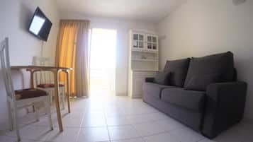 Studio, Balcony, Sea View | Living area