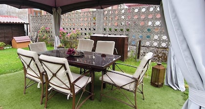 Stone and wood house with a spacious garden by the Cantabrian Sea.