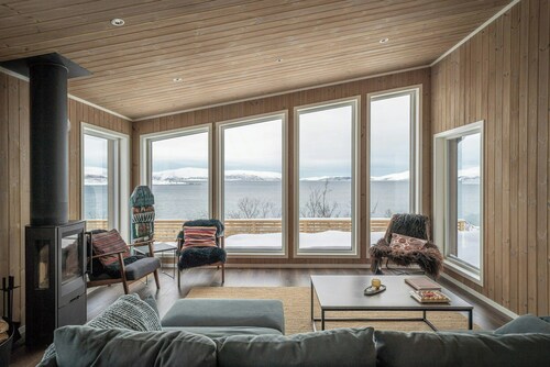Mountains, sea and northern lights right outside