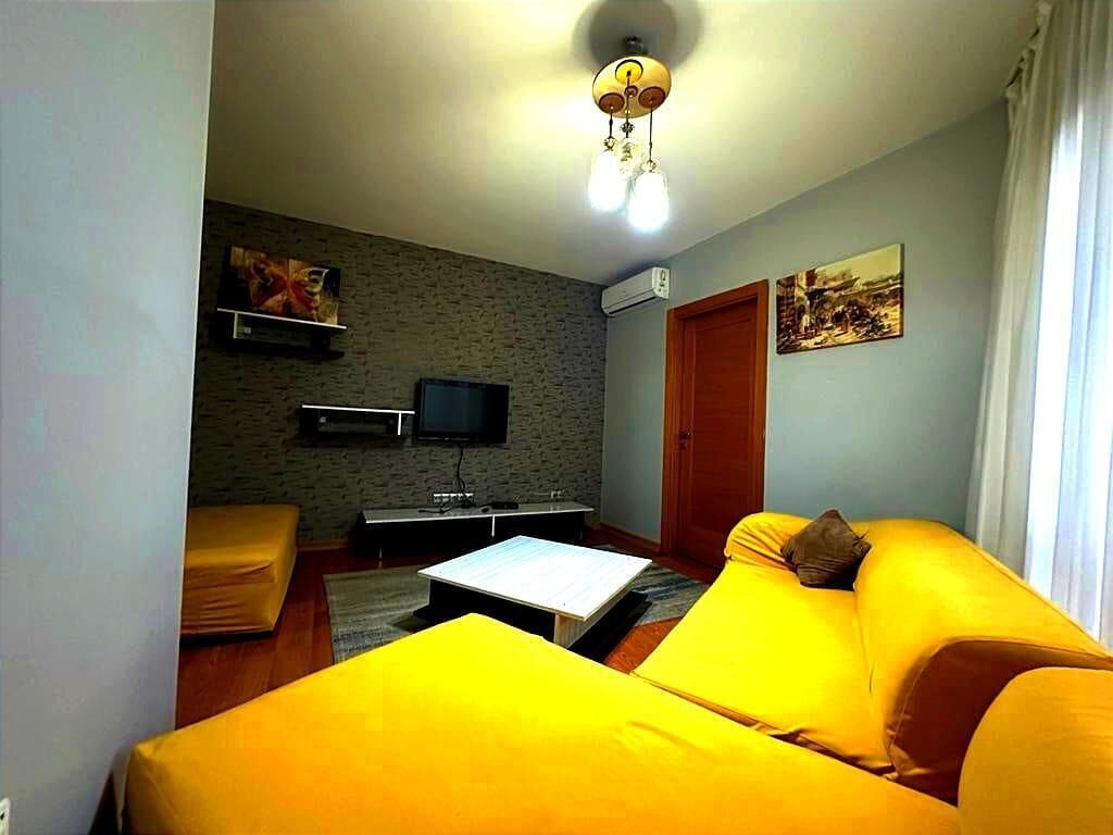 Deluxe appartement, balkon, uitzicht op de stad | Woonruimte