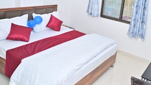 Chambre simple, vue sur la ville