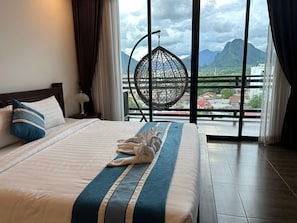 Quarto casal luxo, vista para a cidade