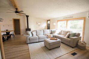 Living area - Private 10-Acre Retreat: Creek, Fire Pit, Boat Parking, Min to Downtown Boyne (Boyne City)