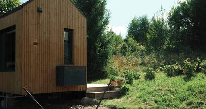 Tiny house between field and forest at Storberget