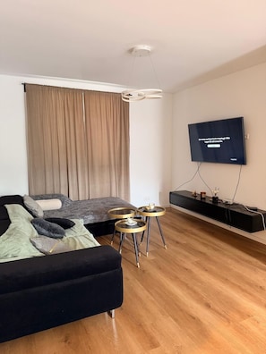Living area - Designer apartment with a 40 m² rooftop terrace – Achern, gateway to the Black Forest (Achern)