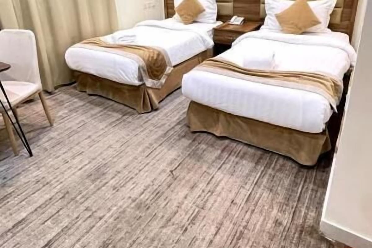 Twin Room | Blackout curtains, iron/ironing board (on request), free WiFi