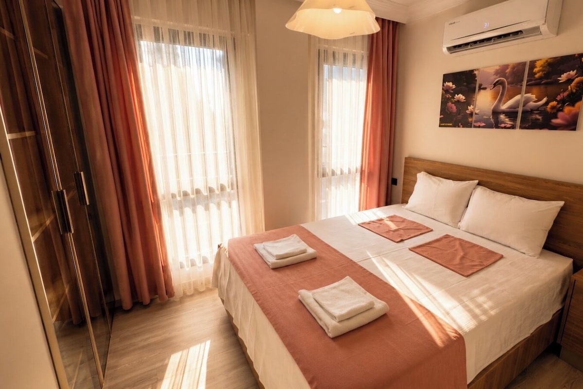 Luxury Apartment, Balcony, Garden View | Laptop workspace, blackout curtains, iron/ironing board, free WiFi