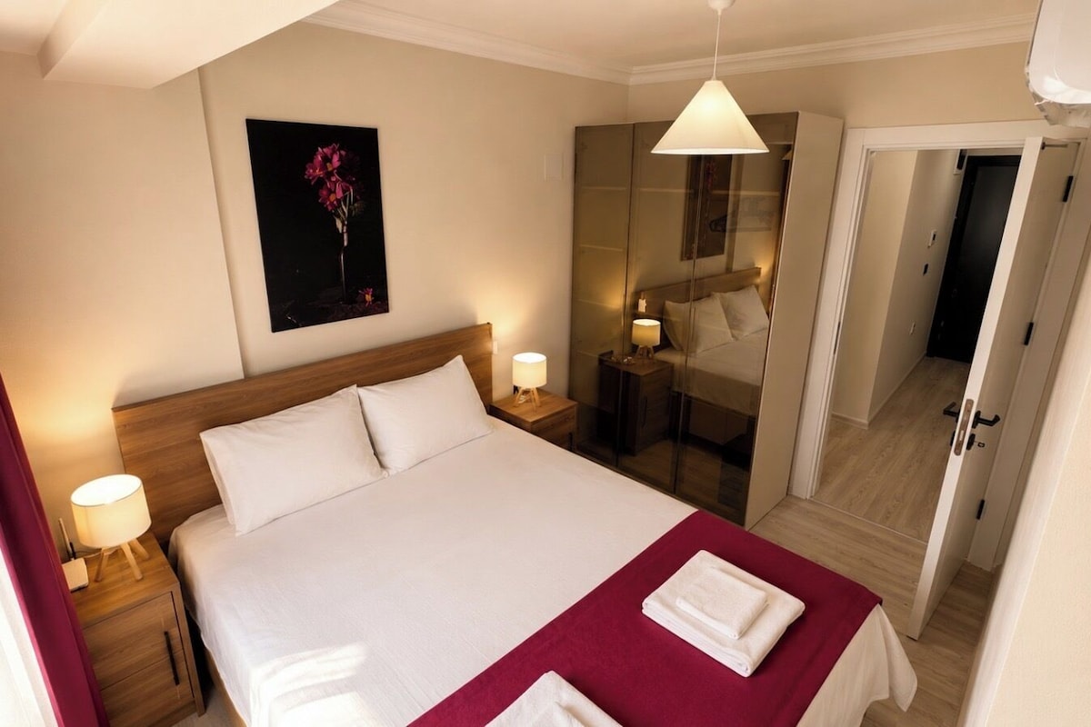 Luxury Apartment, Balcony, Garden View | Laptop workspace, blackout curtains, iron/ironing board, free WiFi