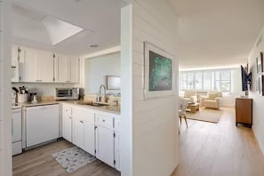 Private kitchen - Wake up to breathtaking direct Gulf-front views at Loggerhead Cay 142. This beautifully updated 2-bedroom, 2-bath beachfront condo sleeps 5 and includes beach gear, a heated pool, pickleball, and everything you need for the perfect Sanibel getaway. (Sanibel Island)