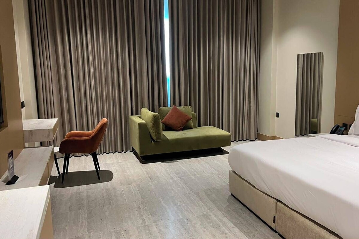 Desk, blackout drapes, iron/ironing board (on request), WiFi (free)