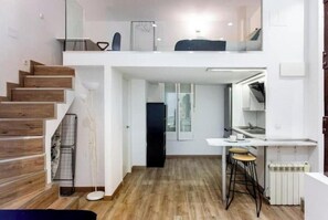 Unclassified image, 5 of 11, button - Industrial-style duplex apartment (Centro)