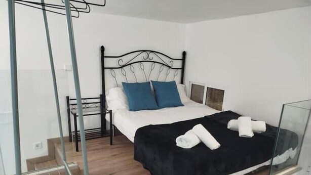 Unclassified image, 1 of 11, button - Industrial-style duplex apartment (Centro)