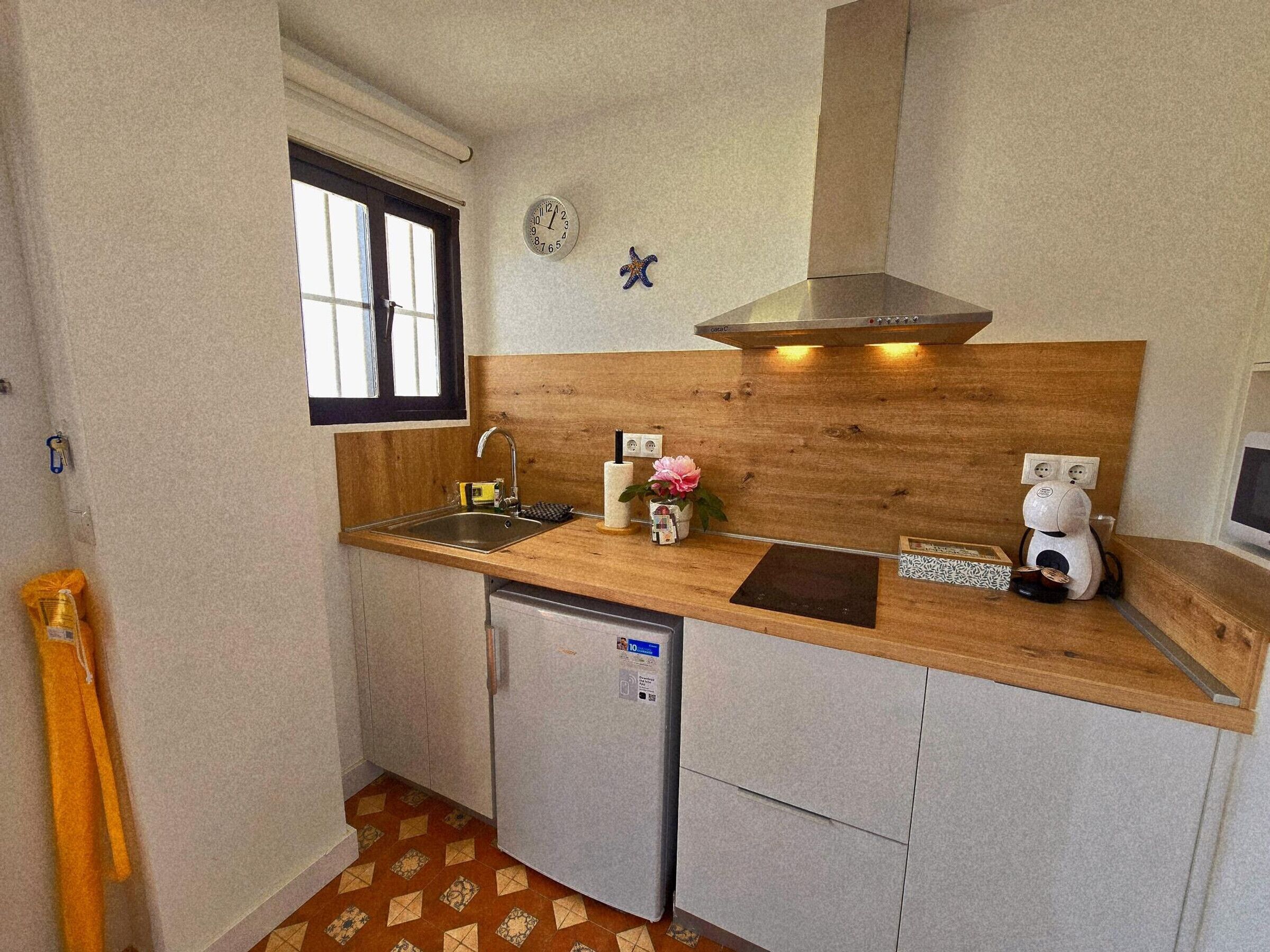 Coffee/tea maker, fridge, microwave, toaster