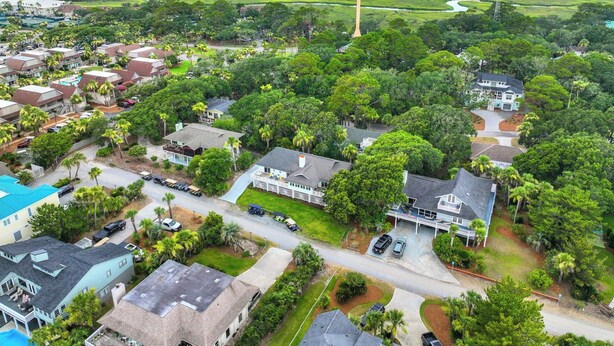 A residential area with houses, roads, and a water tower.