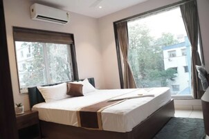 Habitación Premium | Sábanas de algodón egipcio, ropa de cama de alta calidad, caja fuerte