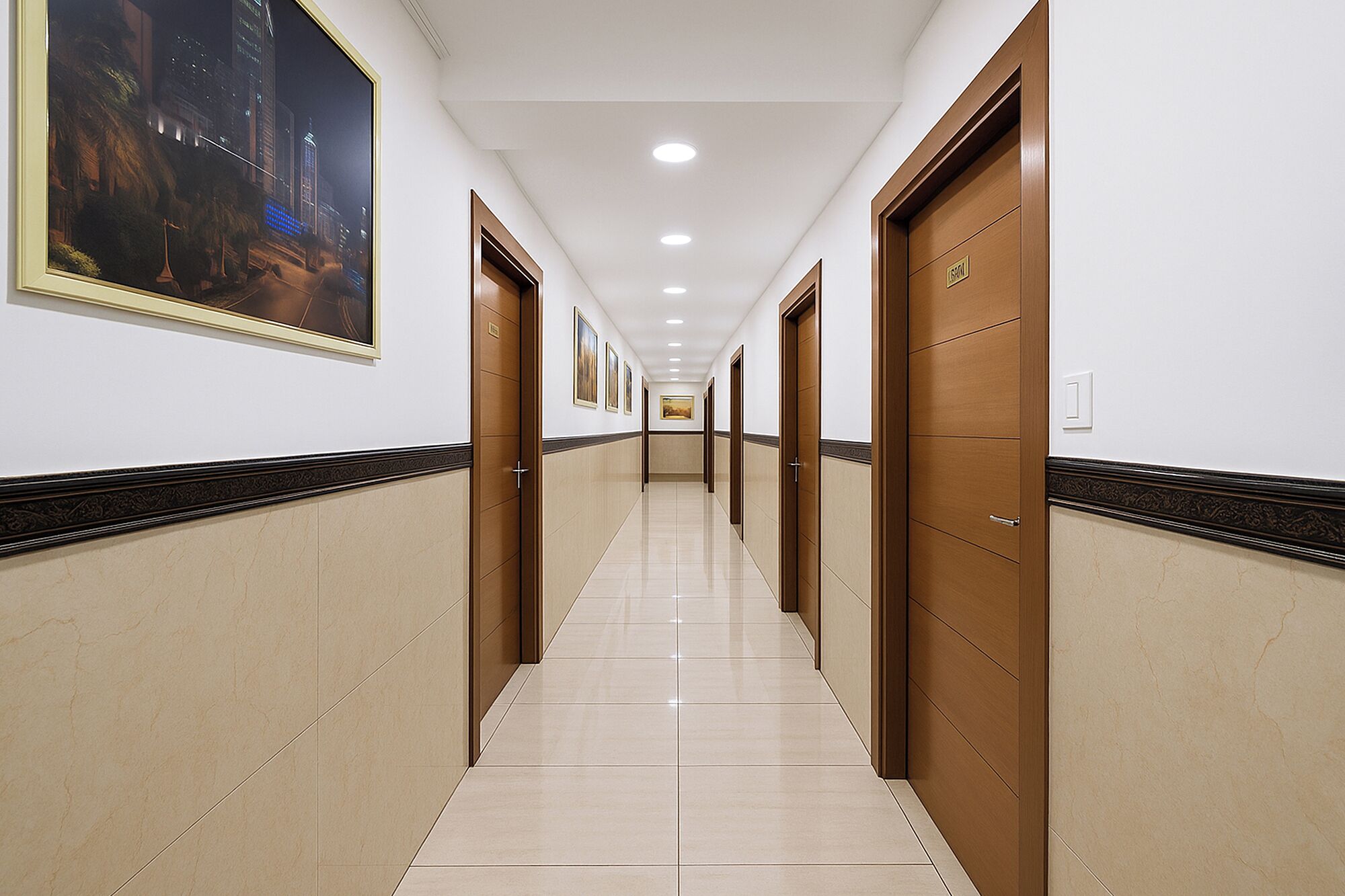 A hotel hallway with doors on both sides, a tiled floor, and a painting on the wall.